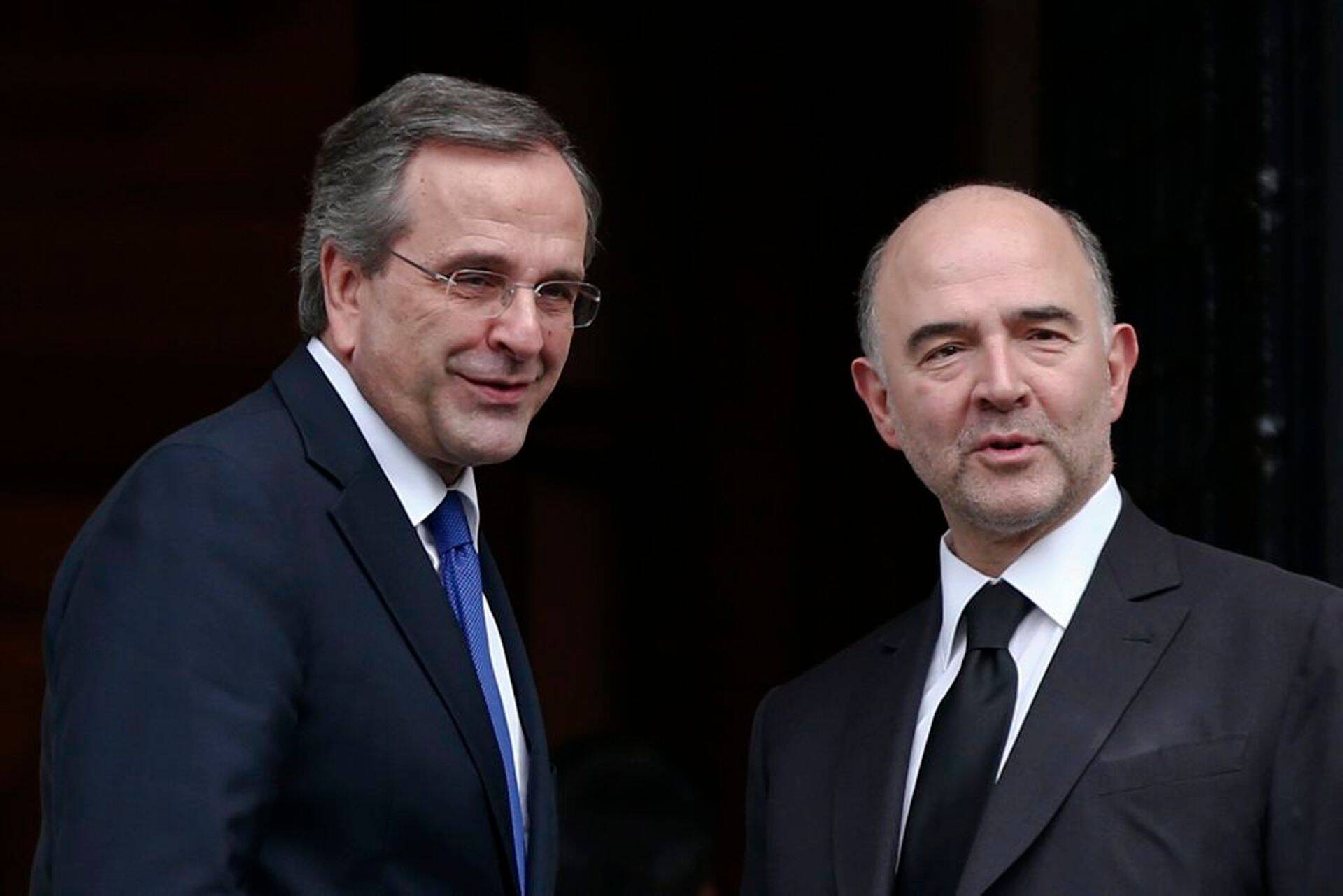 Kreeka peaminister Antonis Samaras ja Euroopa Komisjoni rahandusvolinik Pierre Moscovici Ateenas.