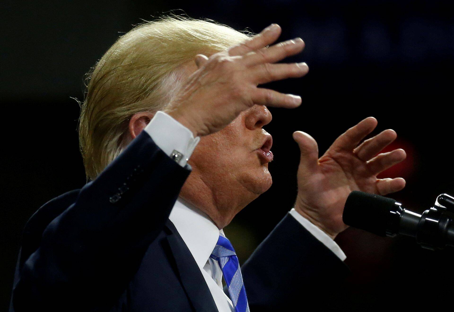 U.S. President Donald Trump speaks at a Make America Great Again rally at the Civic Center in Charleston, West Virginia, U.S., August 21, 2018.    REUTERS/Leah Millis      TPX IMAGES OF THE DAY