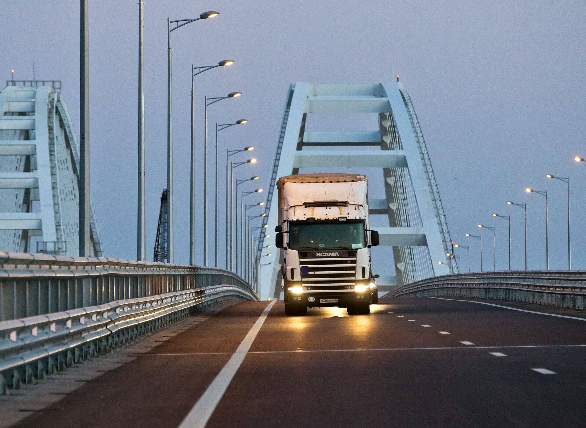 CRIMEA, RUSSIA - OCTOBER 1, 2018: A truck moves along Crimean Bridge across the Strait of Kerch. Sergei Malgavko/TASS