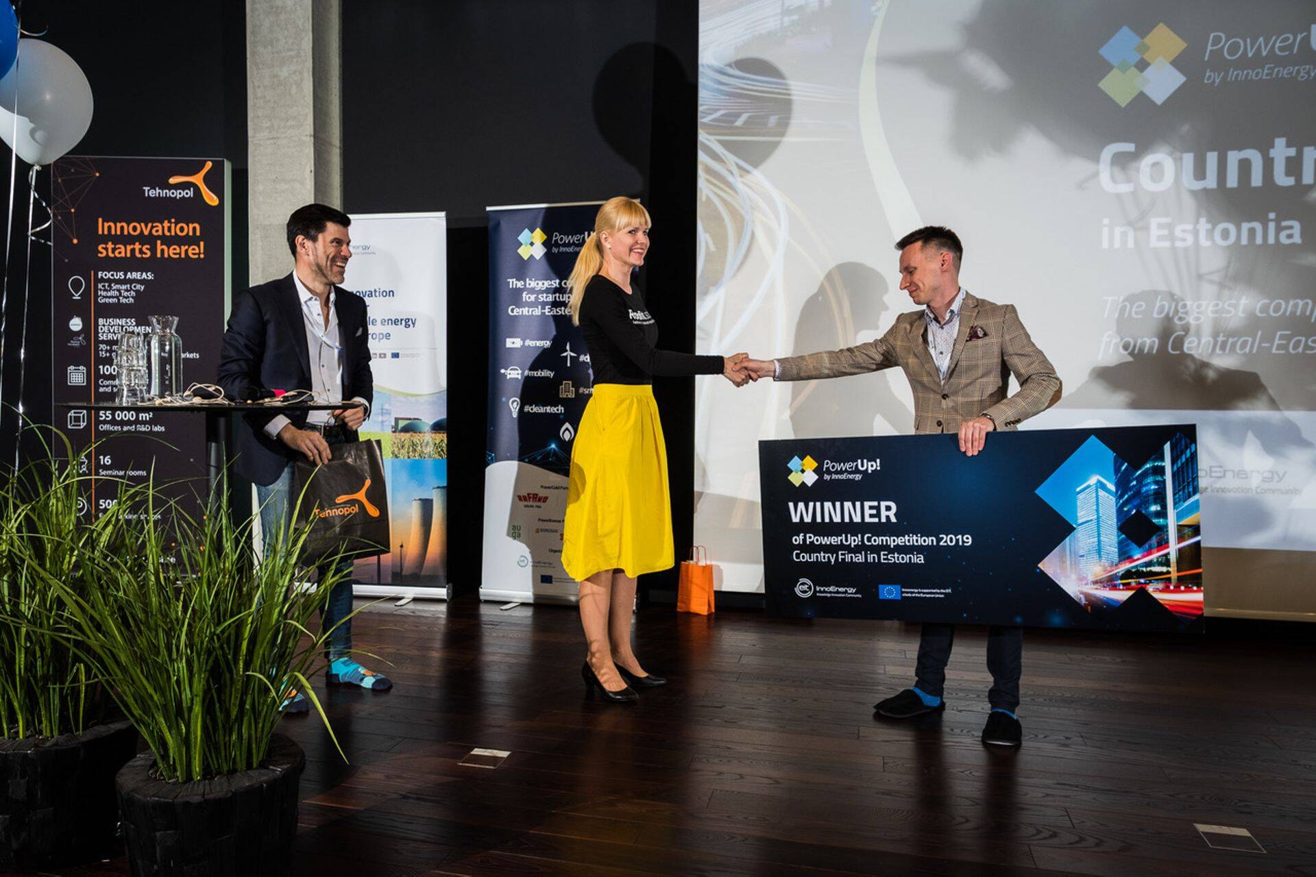 Last year's winner of the PowerUp! Challenge Roofit.Solar, marketing and export manager Helen Anijalg in the middle