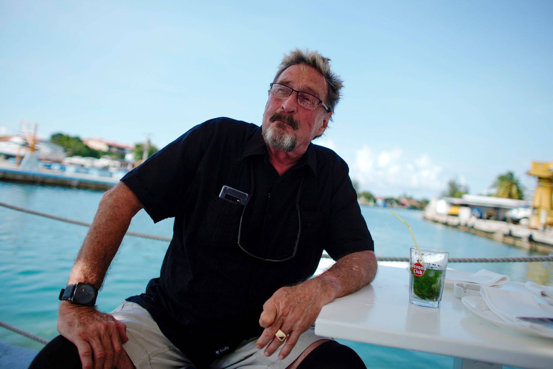FILE PHOTO: John McAfee, co-founder of McAfee Crypto Team and CEO of Luxcore and founder of McAfee Antivirus, speaks during an interview in Havana, Cuba, July 4, 2019. Picture taken July 4, 2019. REUTERS/Alexandre Meneghini/File Photo