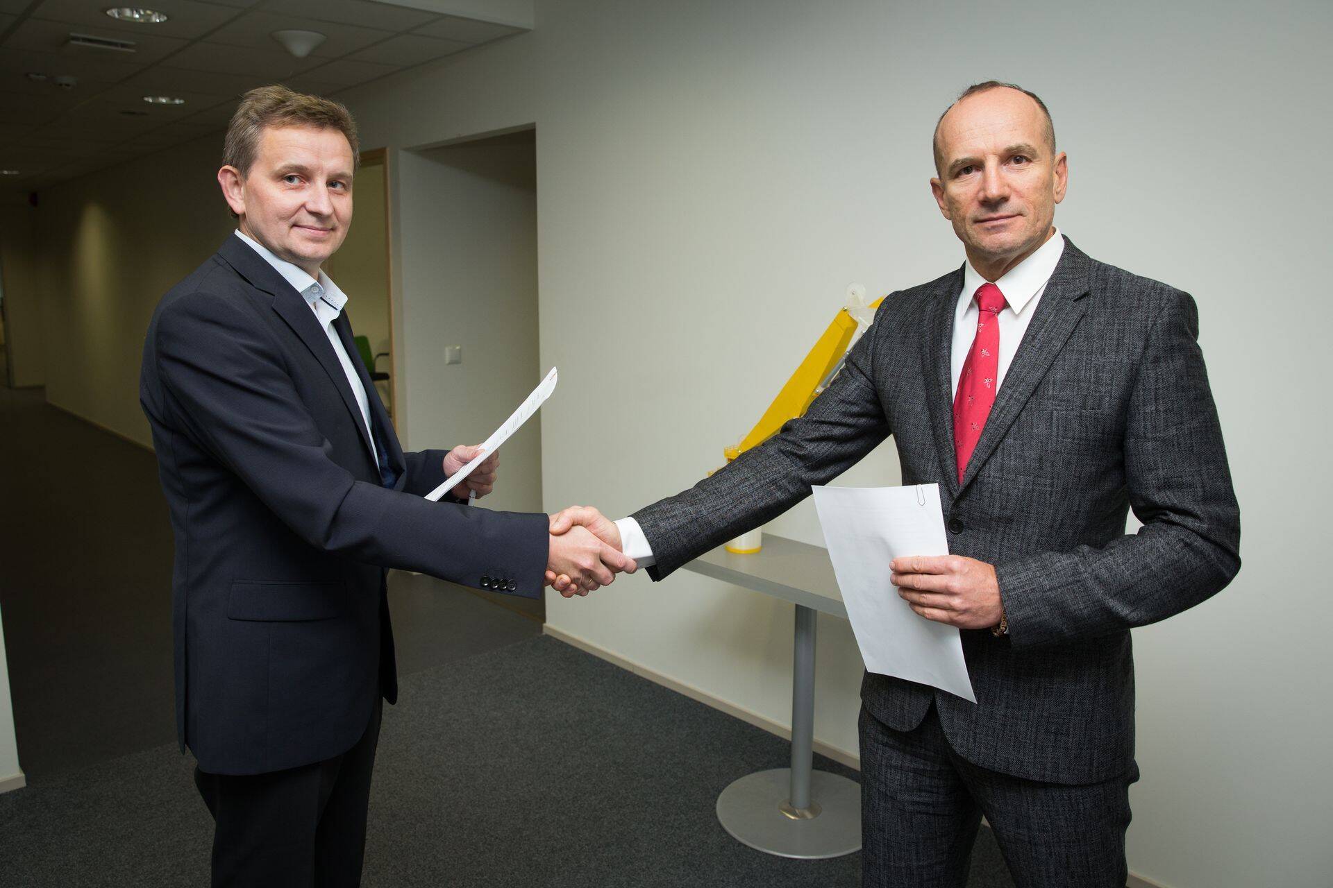 E-Profiili juhatuse esimees Toomas Jõgi ja Eleoni juhatuse liige Oleg Sõnajalg.