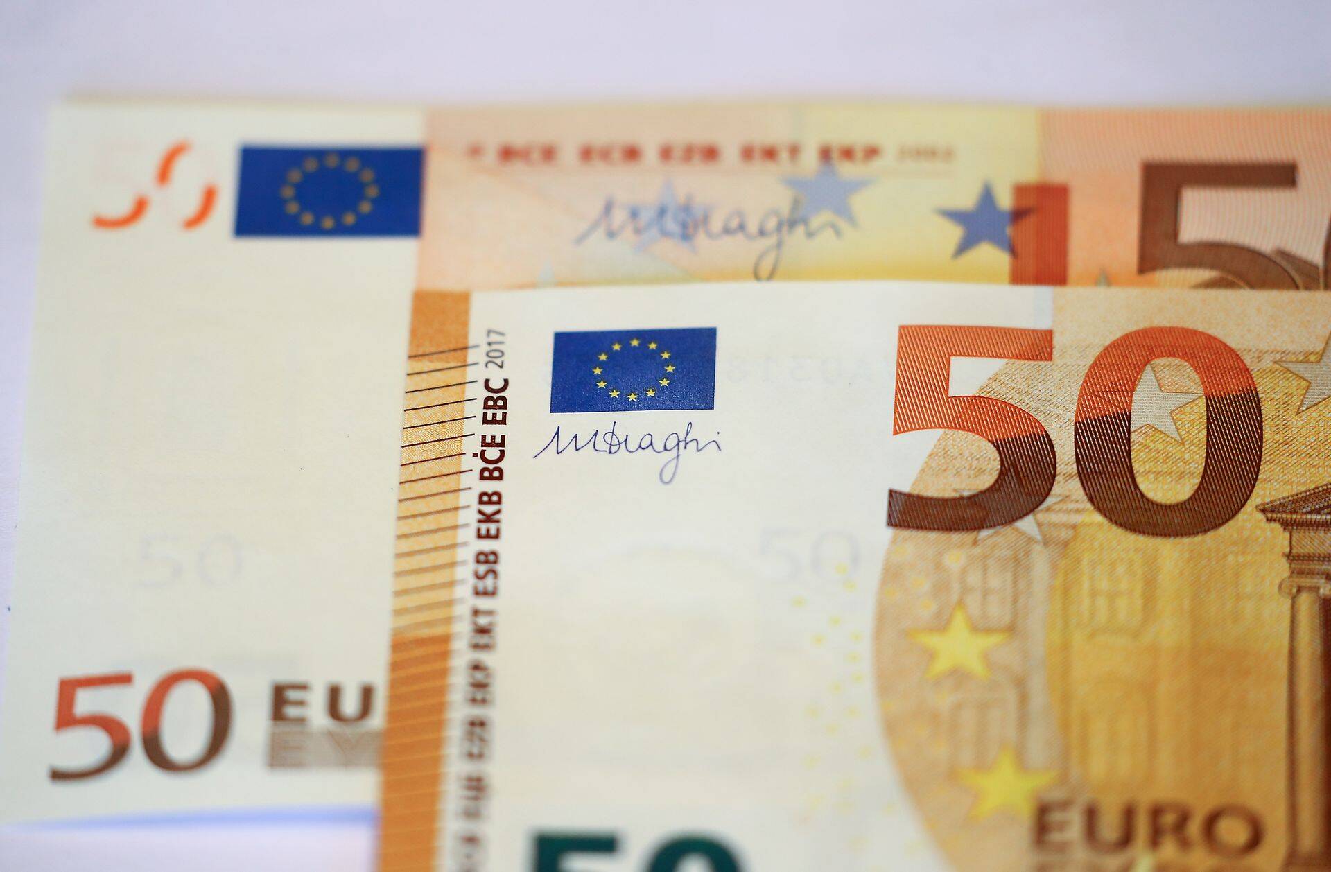 FILE PHOTO: The signature of the President of the European Central Bank (ECB), Mario Draghi, is seen on the new 50 euro banknote during a presentation by the German Central Bank (Bundesbank) at its headquarters in Frankfurt, Germany, March 16, 2017. REUTERS/Kai Pfaffenbach/File Photo