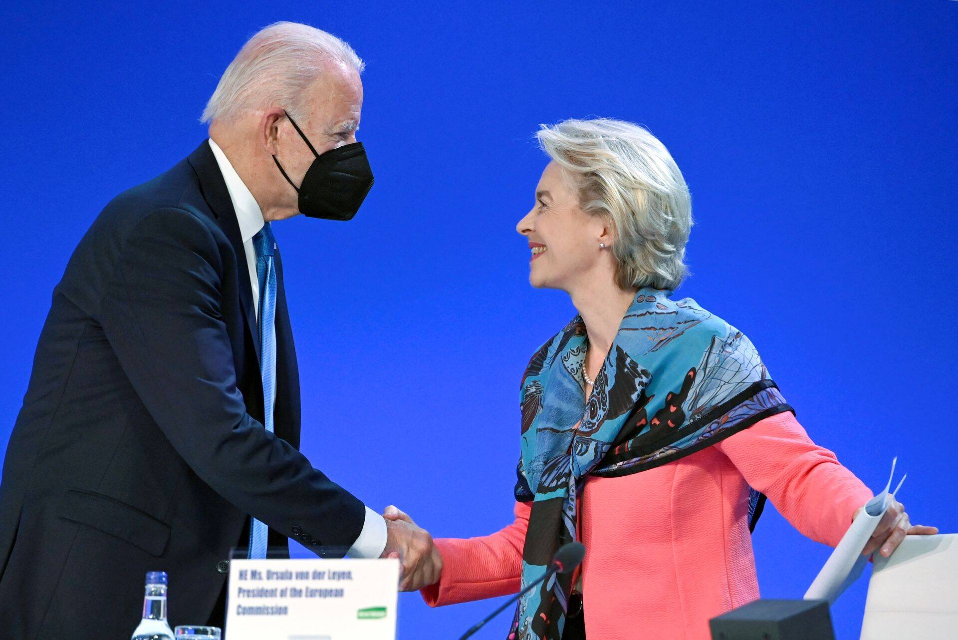 U.S. President Joe Biden greets European Commission President Ursula von der Leyen during the "Accelerating Clean Technology Innovation and Deployment" session at the UN Climate Change Conference (COP26) in Glasgow, Scotland, Britain November 2, 2021. Jeff J Mitchell/Pool via REUTERS