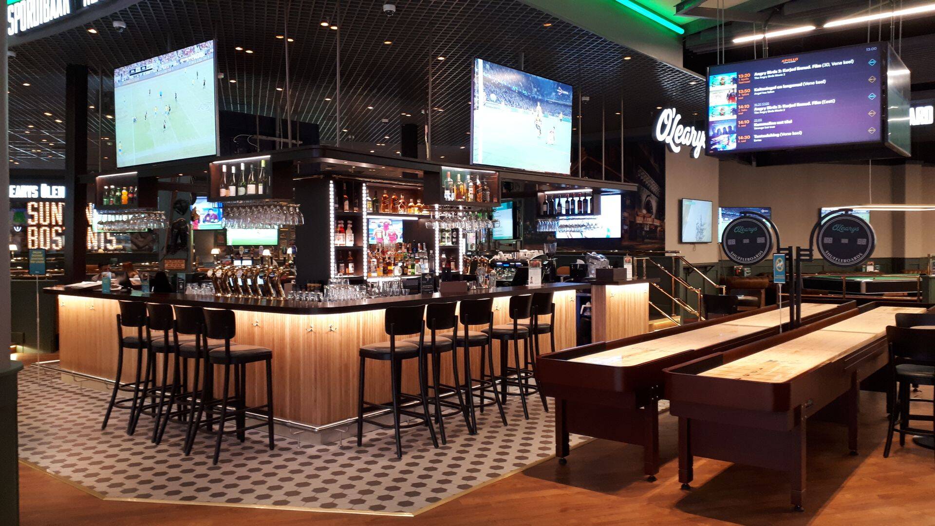 O`Learys Estonia ehitus Ülemiste laiendatud keskuses. Ülemiste keskuse laienduse ehitamise peatöövõtja otsis O`Learise vabaja- ja spordibaari ehitamiseks alltöövõtjat, kes suudaks lühikese aja jooksul valmis ehitada vägagi keeruka sisekujunduse ja suure mahuga objekti. Kuigi ehituse valmimine nõudis ehitajatelt ka töötegemist öötundide arvelt, on tulemiseks suurepärase interjööriga uue kontseptsiooniga vabaajakeskus, kus söömisele-joomisele lähenetakse spordikeskselt.