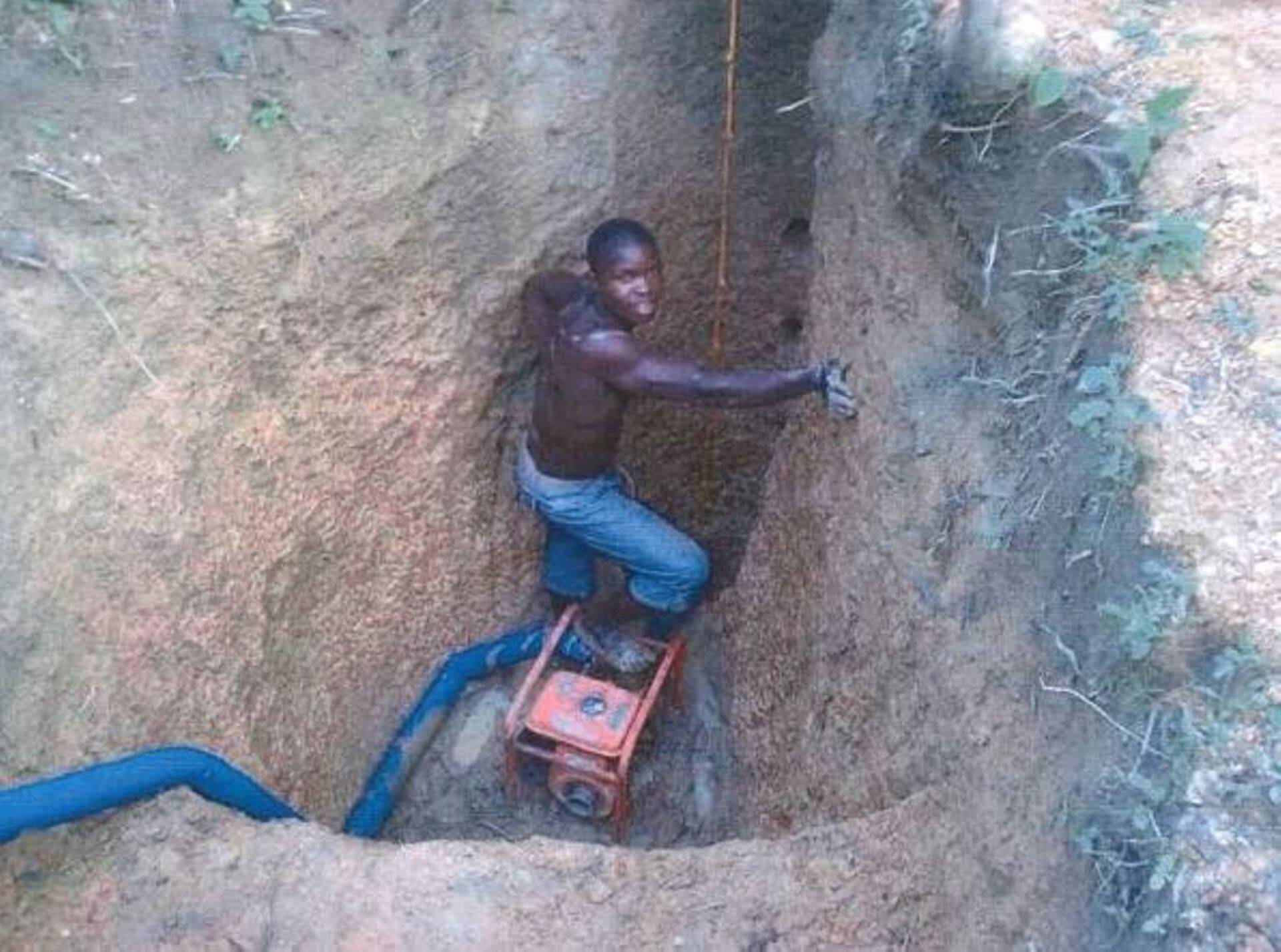 Väljavõte kaevanudsäri esitlusest, kus foto pidi kujutama teostatud uurimistöid Sierra Leone kaevanduses.