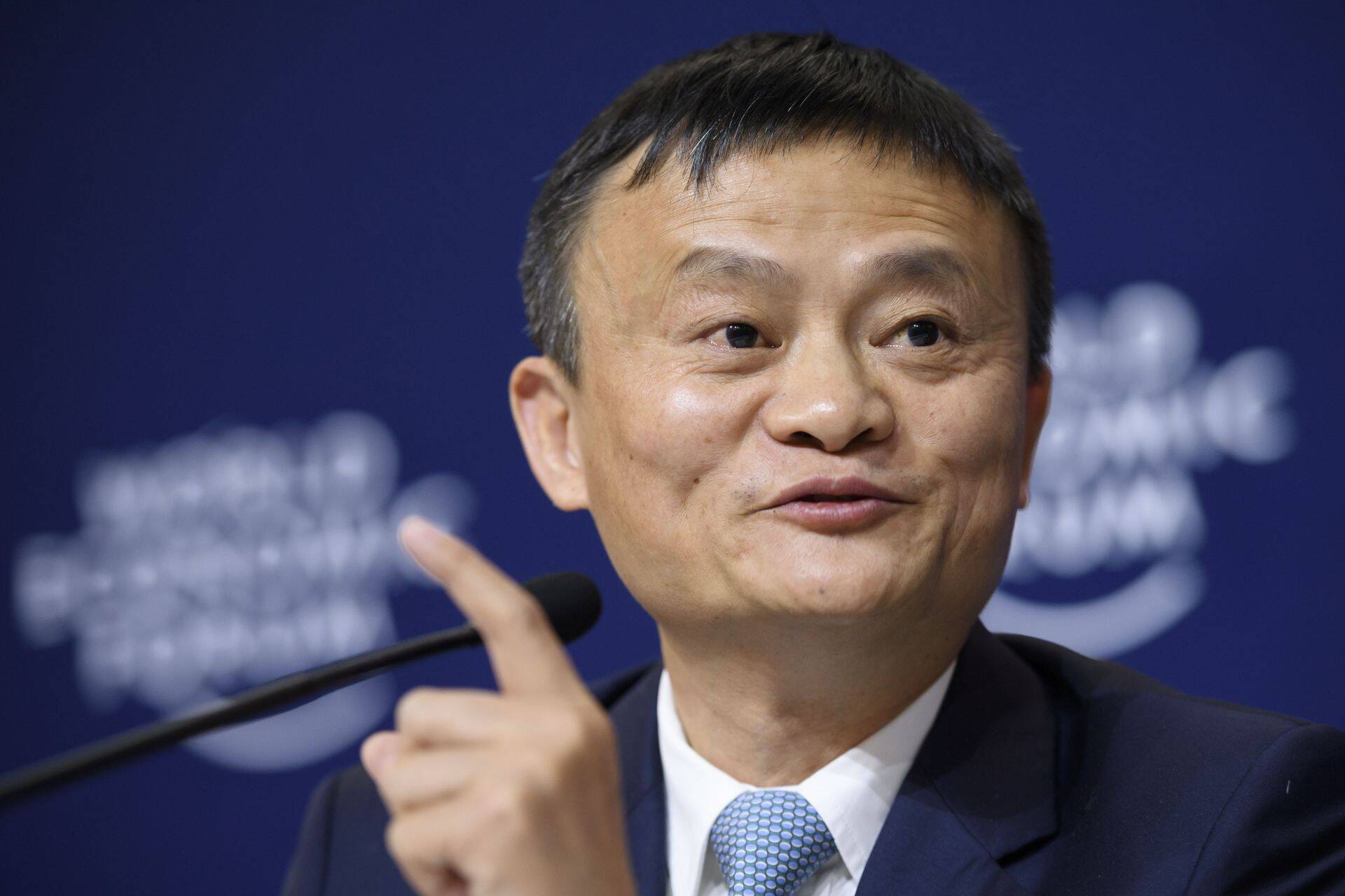 Alibaba Group Founder and Executive Chairman, China's Jack Ma attends the announcement of a long-term partnership of Alibaba as International Olympic Committee (IOC) worldwide sponsors on the sideline of the Forum's annual meeting, on January 19, 2017 in Davos. / AFP PHOTO / FABRICE COFFRINI