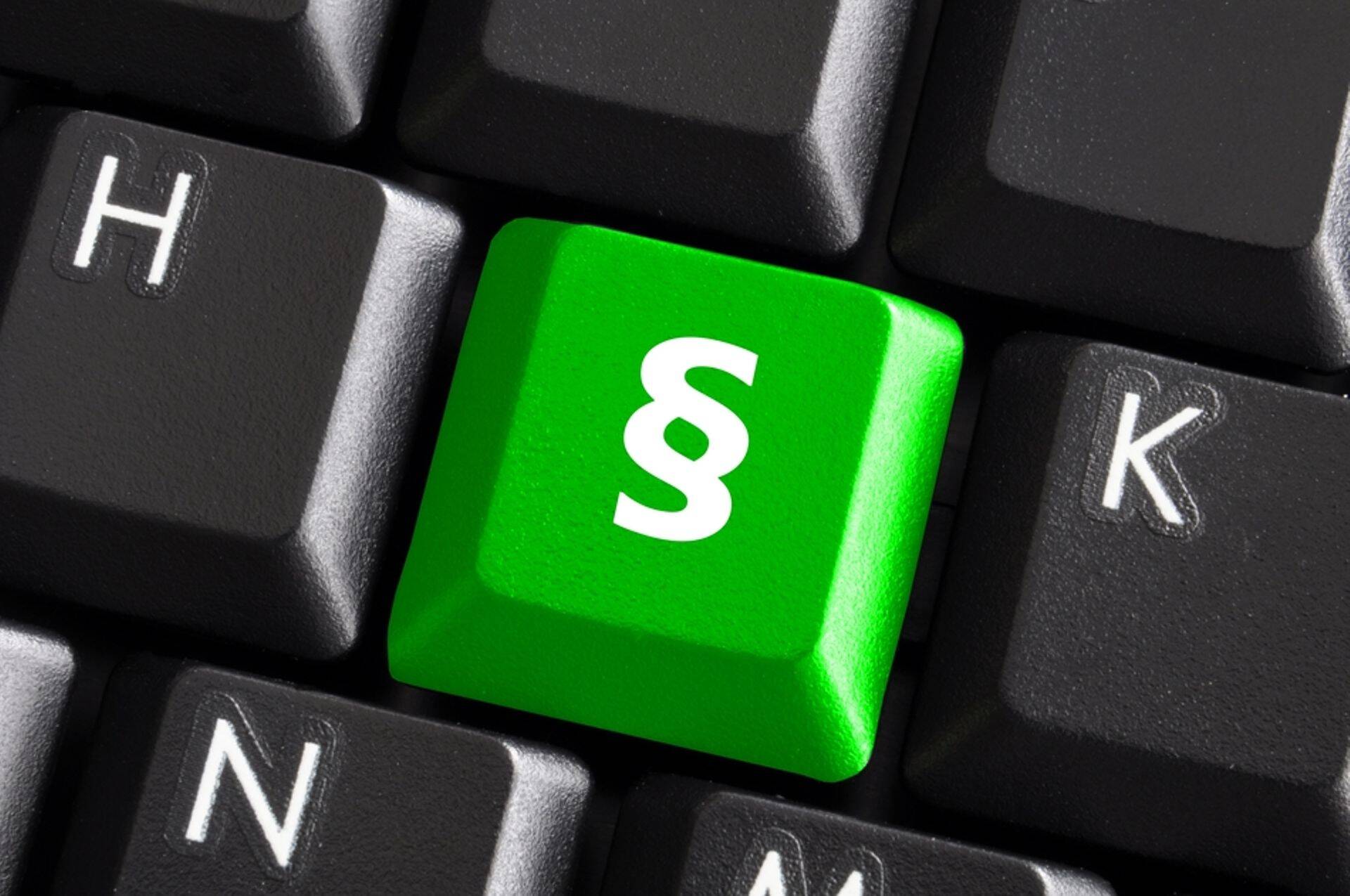 Paragrahvi nupp klaviatuuril. Pilt on illustreeriv.