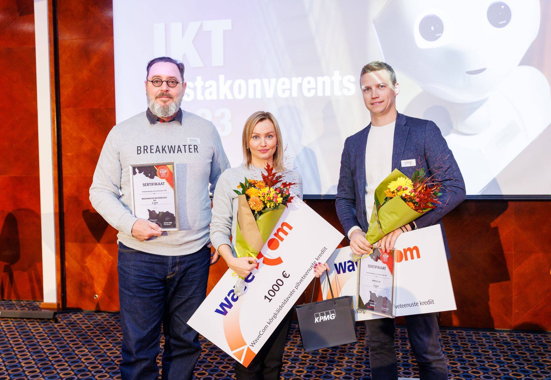 Руководители Breakwater Technology Грант Бретт и Кристина Сисин, а также глава Nortal Eesti Атс Альбре на конференции ИКТ, состоявшейся на прошлой неделе. Представитель компании-победителя не присутствовал на конференции.
